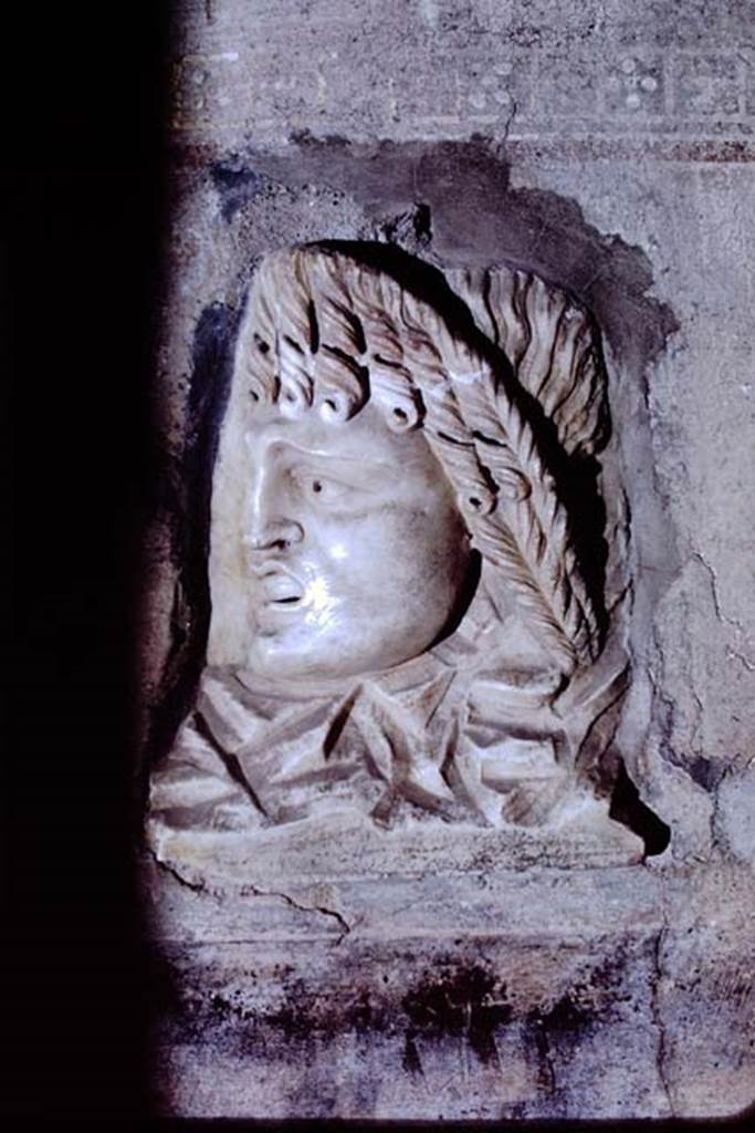 VI.16.7 Pompeii, 1968. Fragment of a relief with a mask, found embedded on the south side of the west wall, near south-west corner. Photo by Stanley A. Jashemski.
Source: The Wilhelmina and Stanley A. Jashemski archive in the University of Maryland Library, Special Collections (See collection page) and made available under the Creative Commons Attribution-Non Commercial License v.4. See Licence and use details. J68f0233