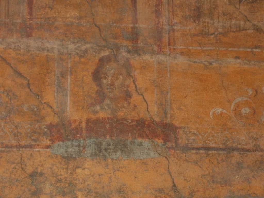 VI.16.7 Pompeii. December 2004. Room N, painting of face on east end of north wall.