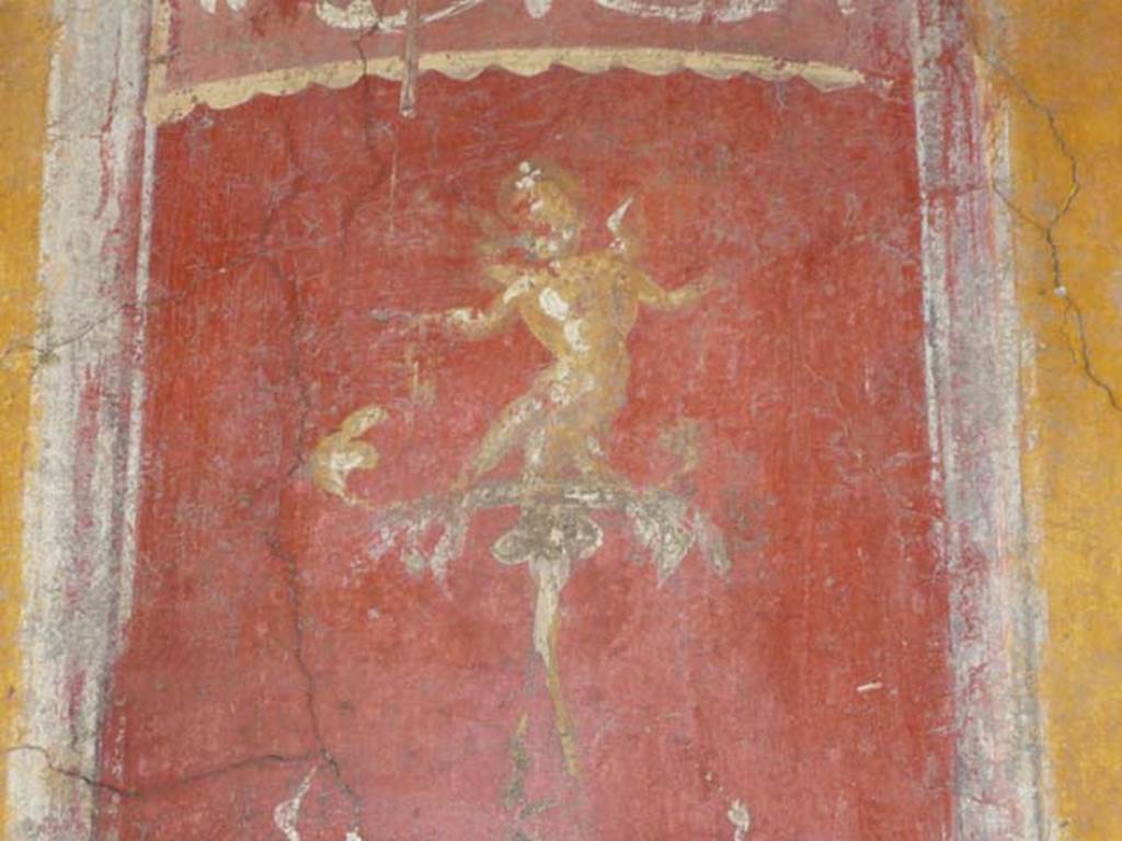 VI.16.7 Pompeii. June 2013. Room N, detail of cupid on candelabra on east wall, after restoration.
Photo courtesy of Buzz Ferebee.