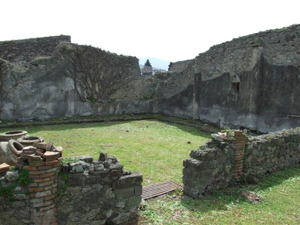VI.16.27 Pompeii. March 2009. Looking south-west across peristyle garden M, with entrance in north wall.