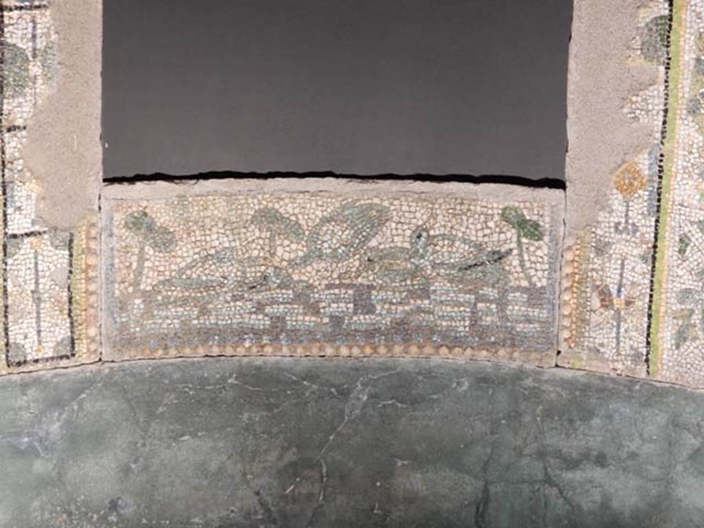 VI.17.42, Pompeii, May 2018. Detail at rear of reconstruction of base of nymphaeum. Photo courtesy of Buzz Ferebee.