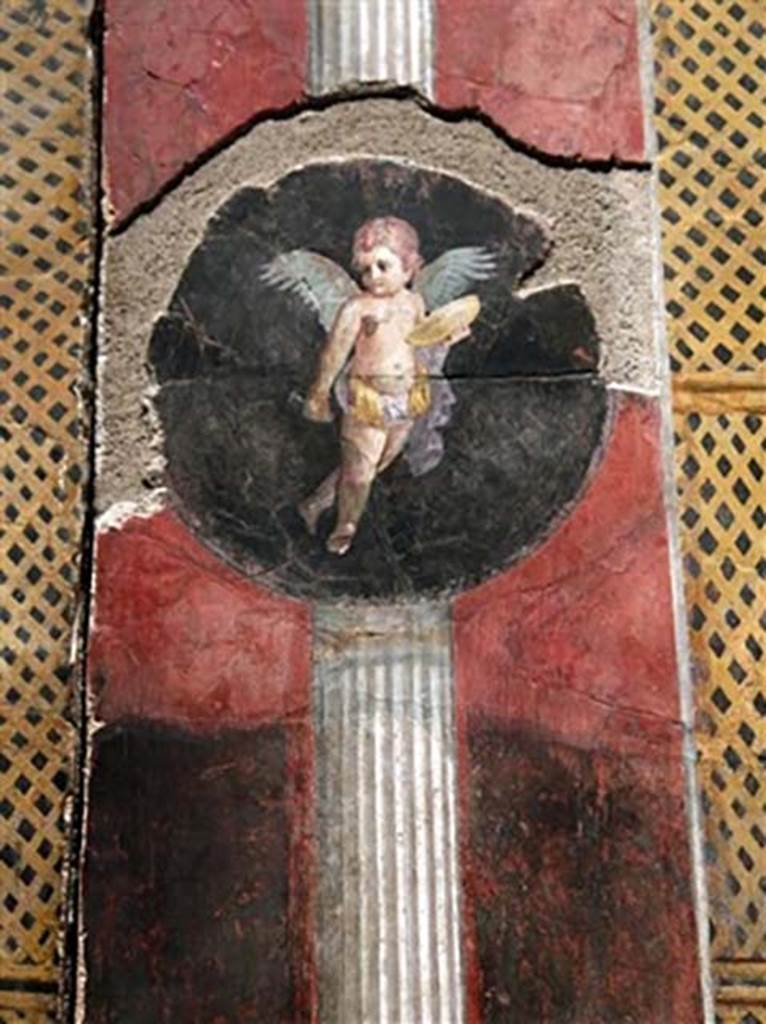 VI.17.42 Pompeii. Summer triclinium 31, south wall, detail of painting of a cupid.
Detail from the large garden fresco, inventory number 59467.
Photographed at “A Day in Pompeii” exhibition at Melbourne Museum. September 2009.