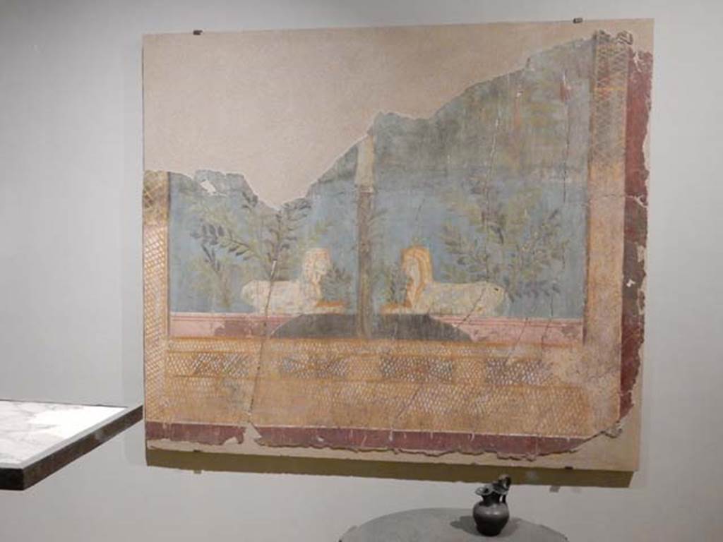 VI.17.42, Pompeii, May 2018.
Fragment of the wall of the summer triclinium 31 decorated with a pair of facing Sphynxes within a lush garden.
Archaeological Park of Pompeii, inv 87228. Photo courtesy of Buzz Ferebee.