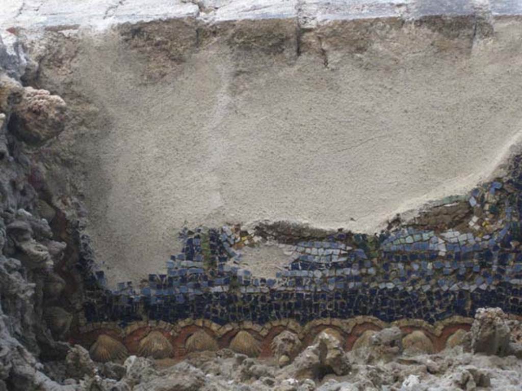 VII.1.8 Pompeii. July 2012. Nymphaeum G, west wall, detail from south end of mosaic at top of niche. Photo courtesy of Sharon M. Wolf.