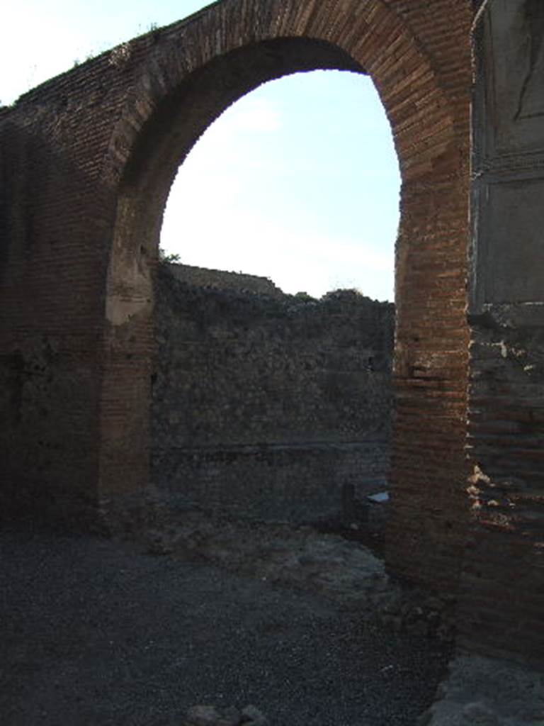 VII.1.8 Pompeii. December 2006. Arch in north wall of nymphaeum F.