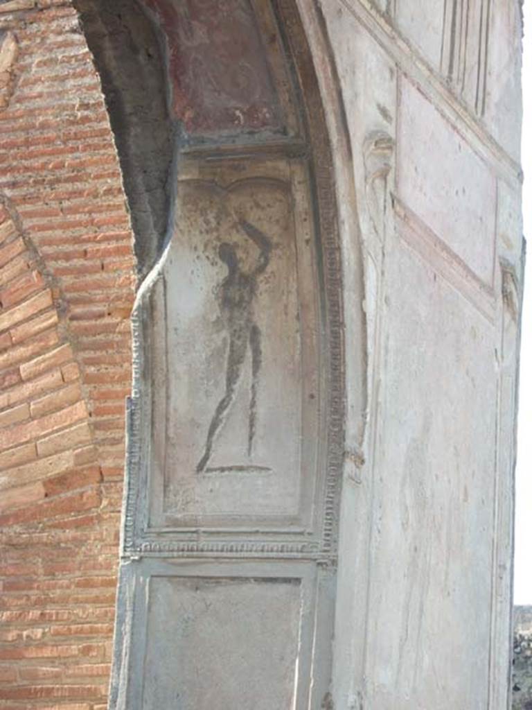 VII.1.8 Pompeii. September 2005. Nymphaeum F, east wall.
Decorative stucco plasterwork figure on north side of arch.
