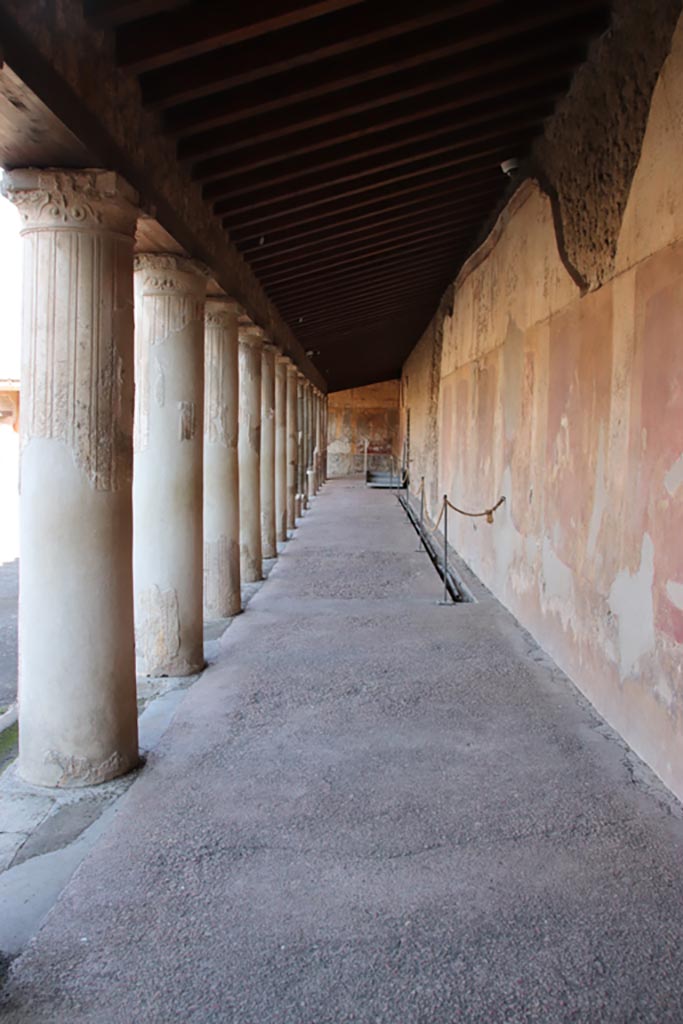 VII.1.8 Pompeii. October 2022.
Looking north in corridor on east side of Portico B. Photo courtesy of Klaus Heese.