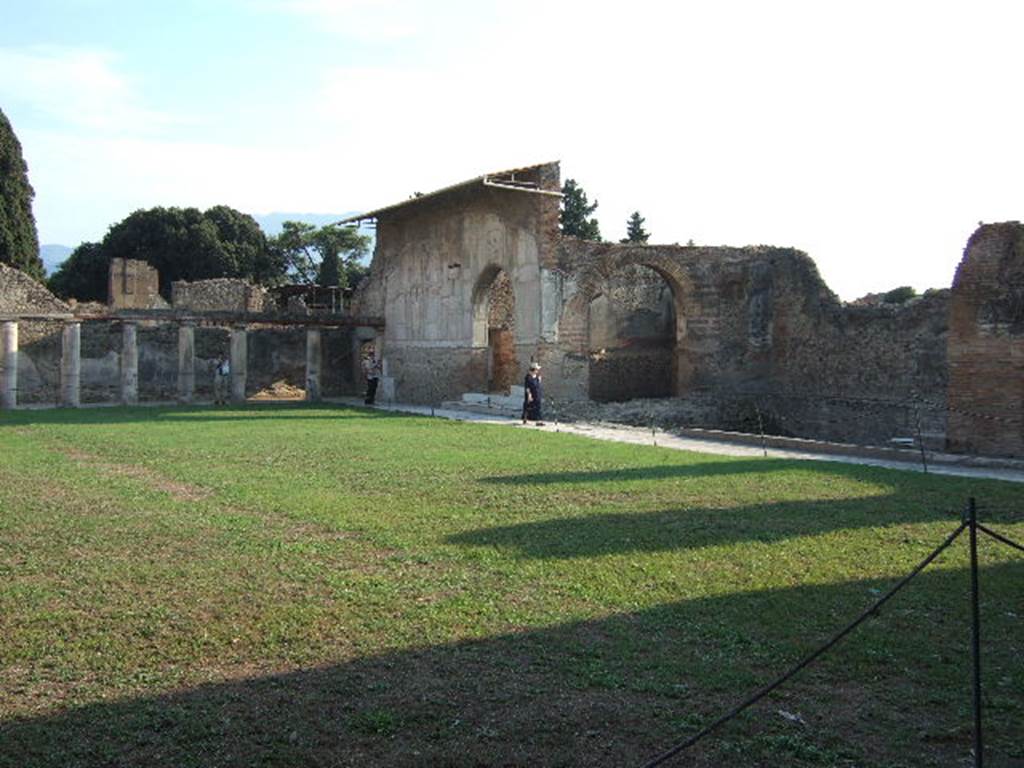 VII.1.8 Pompeii. September 2005.
Looking across gymnasium C towards south side of portico B and west side of baths, from north-east corner.