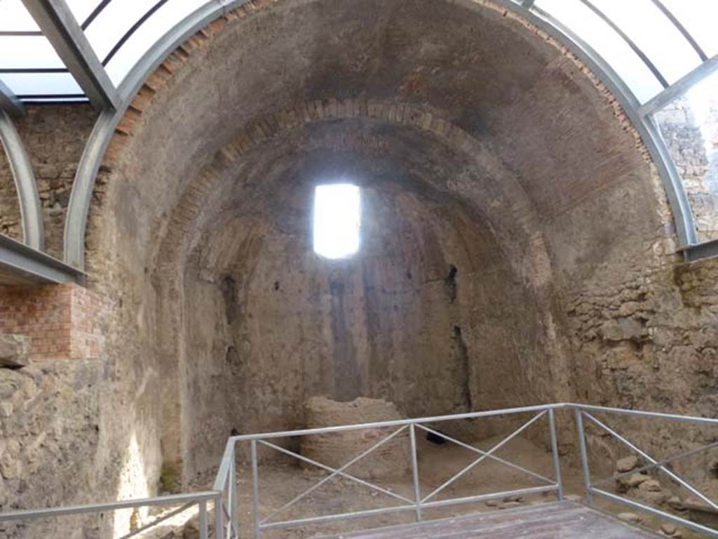 VII.1.8 Pompeii. June 2012. West end of men’s calidarium 5 with remains of support for marble drinking water basin. Photo courtesy of Michael Binns.