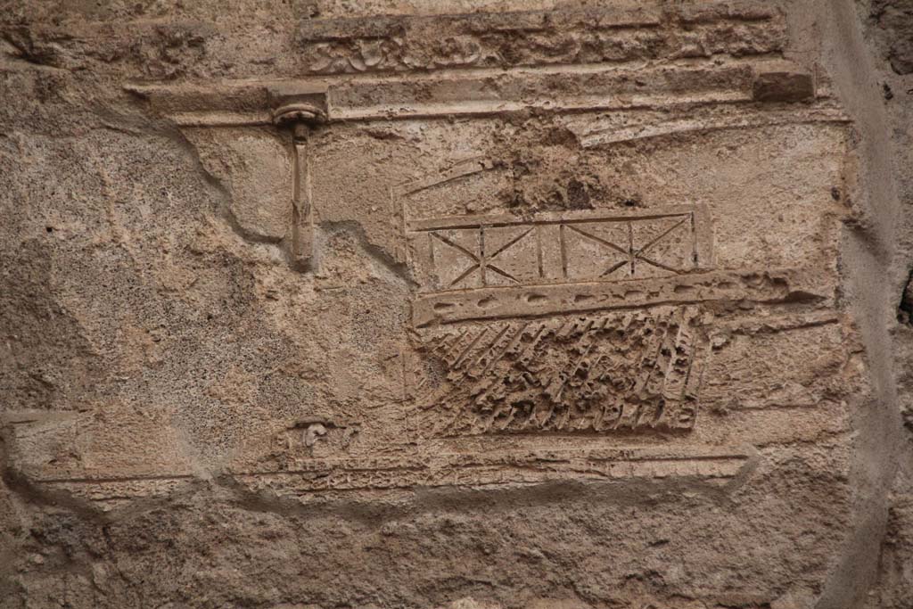 VII.1.8 Pompeii. April 2014. Men’s tepidarium 3, detail of decoration on upper west wall at north end.
Photo courtesy of Klaus Heese.