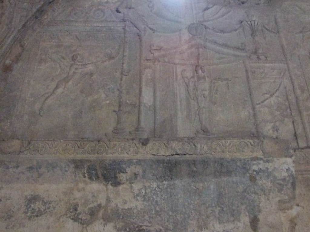 VII.1.8 Pompeii. September 2005. Detail of stucco plaster from west wall in men’s changing room 2.