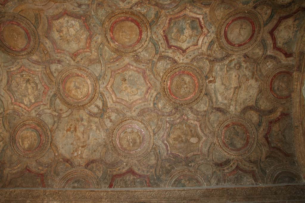 VII.1.8 Pompeii. April 2013. Vestibule 1, stucco on north side, near to apodyterium/changing room, on right.
Photo courtesy of Klaus Heese.