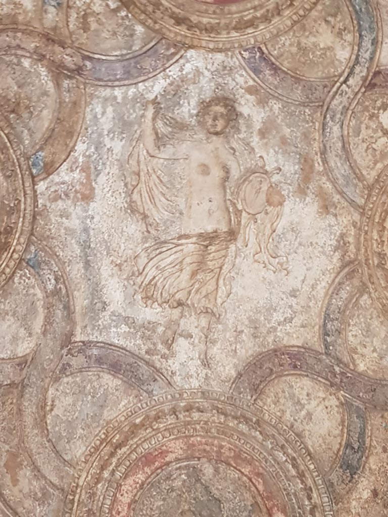 VII.1.8 Pompeii. October 2022.
Maenad from the ceiling on north side of vestibule 1, near the men’s changing room.
Photo courtesy of Klaus Heese.