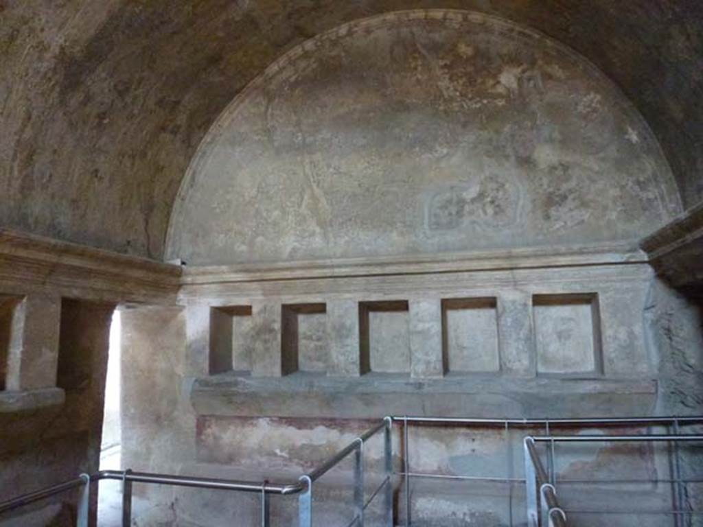 VII.1.8 Pompeii. June 2012. East wall of women’s changing room 11. The doorway to corridor 12 leading to entrance at VII.1.17 is on the left. Photo courtesy of Michael Binns.