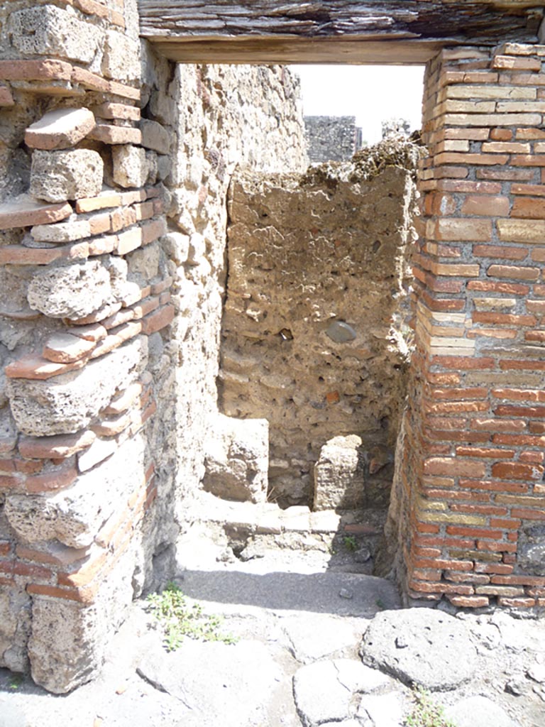 VII.1.36 Pompeii. October 2009. Doorway to latrine. Photo courtesy of Jared Benton.