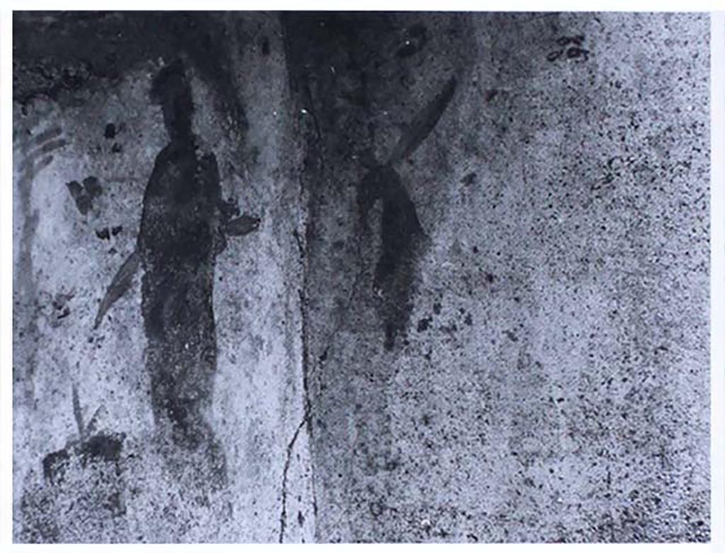 VII.1.46 Pompeii. Old undated photograph of niche lararium, room 14.
On the back wall of the niche, is Vesta sacrificing on a round altar to her right.
On the right-side panel, a devoted donkey that turned the millstones has been given a place facing the goddess.
According to Bragantini, these paintings were very popular but of a low quality and were frequently renovated.
See Carratelli, G. P., 1990-2003. Pompei: Pitture e Mosaici: Vol. VI. Roma: Istituto della enciclopedia italiana, p. 301.