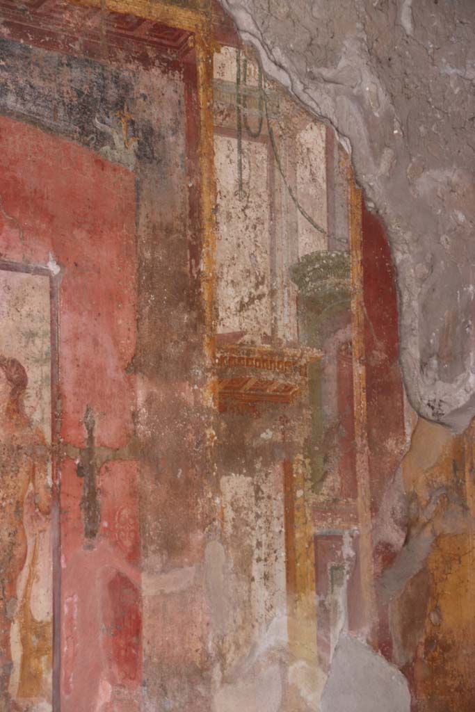 VII.1.47 Pompeii, September 2017. Exedra 10, detail of painted decoration on north side of central painting on west wall.
Photo courtesy of Klaus Heese.