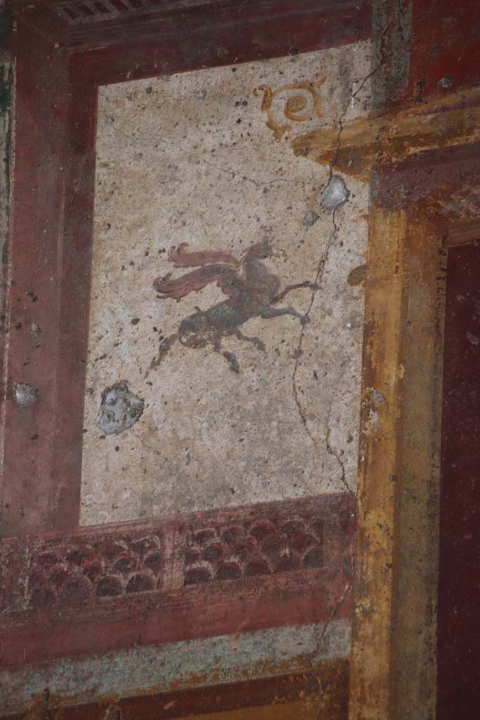 VII.1.47 Pompeii. September 2017. Exedra 10, detail from upper north wall at west end.
Photo courtesy of Klaus Heese.