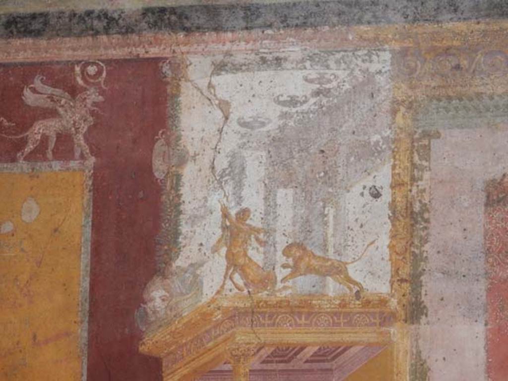 VII.1.47 Pompeii. May 2017. Exedra 10, detail of centaur and lion from north wall at west end. Photo courtesy of Buzz Ferebee.