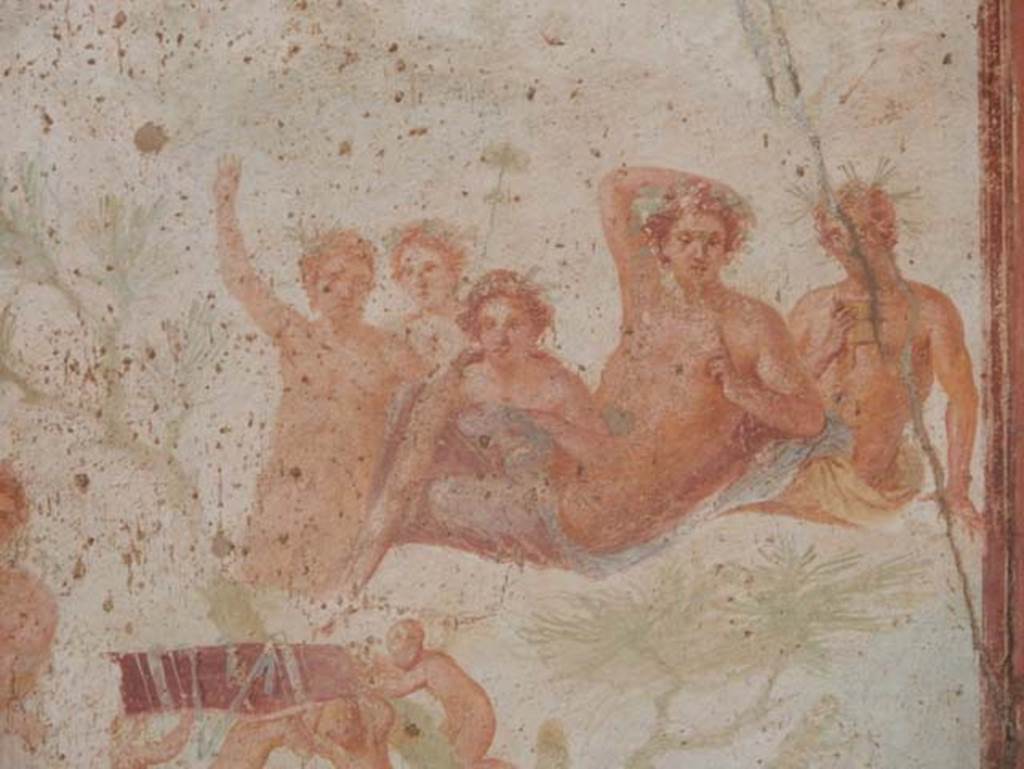 VII.1.47 Pompeii. May 2017. Exedra 10, detail from central painting on north wall.
On the right, half way up a mountain, sits Bacchus, surrounded by his attendants.
Photo courtesy of Buzz Ferebee.
