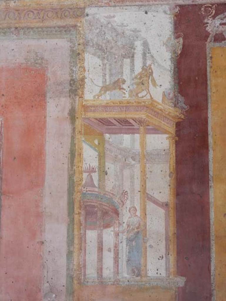 VII.1.47 Pompeii. May 2018.
Exedra 10, detail figure of muse (Clio or Calliope?) in painted architectural decoration on east side of central painting on north wall.
Photo courtesy of Buzz Ferebee.
See Helbig, W., 1868. Wandgemälde der vom Vesuv verschütteten Städte Campaniens. Leipzig: Breitkopf und Härtel, 860.
See Carratelli, G. P., 1990-2003. Pompei: Pitture e Mosaici: Vol VI. Roma: Istituto della enciclopedia italiana, p.269.