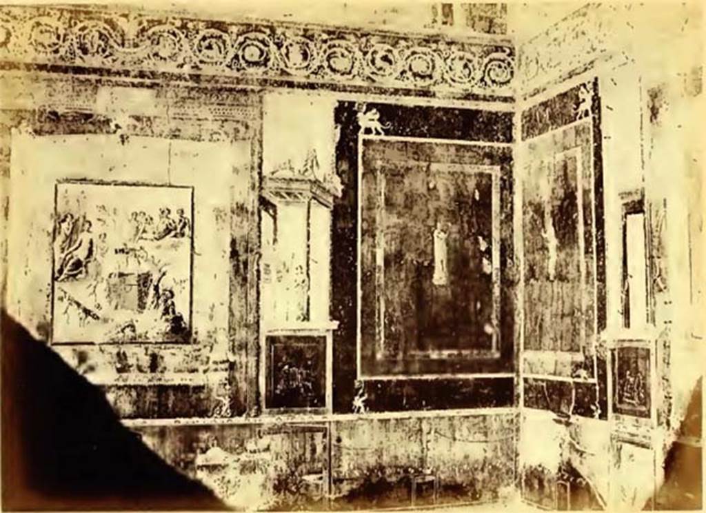 VII.1.47 Pompeii. 1867. Exedra 10 in north-east corner of atrium.
According to Dyer:
“The spacious and lofty exedra in which these paintings are found, has a threshold of white mosaic bordered with black zones, with ornaments in the middle like shields, in the shape of a half-moon. The floor is painted with black fillets, except a piece of mosaic in the centre, in which are represented two diotae or double-handled wine jars, with shoots of vine which interlace and surround a rectangular piece of marble, formed of twenty-two squares of giallo antico.
The walls, which are painted in yellow compartments on a red background, terminate above in a bold scroll border, within the spirals of which are depicted quadrupeds and winged cupids in various attitudes. Above this border, up to the roof, the walls are painted with pieces of architecture and other ornaments.
The whole is surrounded by a small cornice supporting the roof, which is richly decorated with stuccoes and gilt bas-reliefs.
The three paintings are upon a red background, and framed as it were in a meander in the fashion of a cornice, and adorned at the corners with fantastically shaped animals.
At the sides of them are seen capricious pieces of architecture, on the top of which as on an acroterium, stand centaurs and beasts in ferocious attitudes.
Those on each side of the painting of Hercules contain the image of Apollo Musagetes, with the bow and lyre (not seen in the photograph), and the Muse Calliope, with a roll of paper in her hand.
The remaining Muses, painted on a yellow background with accurate execution and vivid colouring, decorate the other compartments of the exedra, together with some views of houses and landscapes.
The podium, or part near the floor, is painted black and divided into square compartments, ornamented with festoons of plants attached to candelabra supporting spheres with aquatic plants, bucrania, or ox-heads, and Bacchic vases.”
See Dyer, T., 1867. The Ruins of Pompeii. London: Bell and Daldy. (p.82-83)