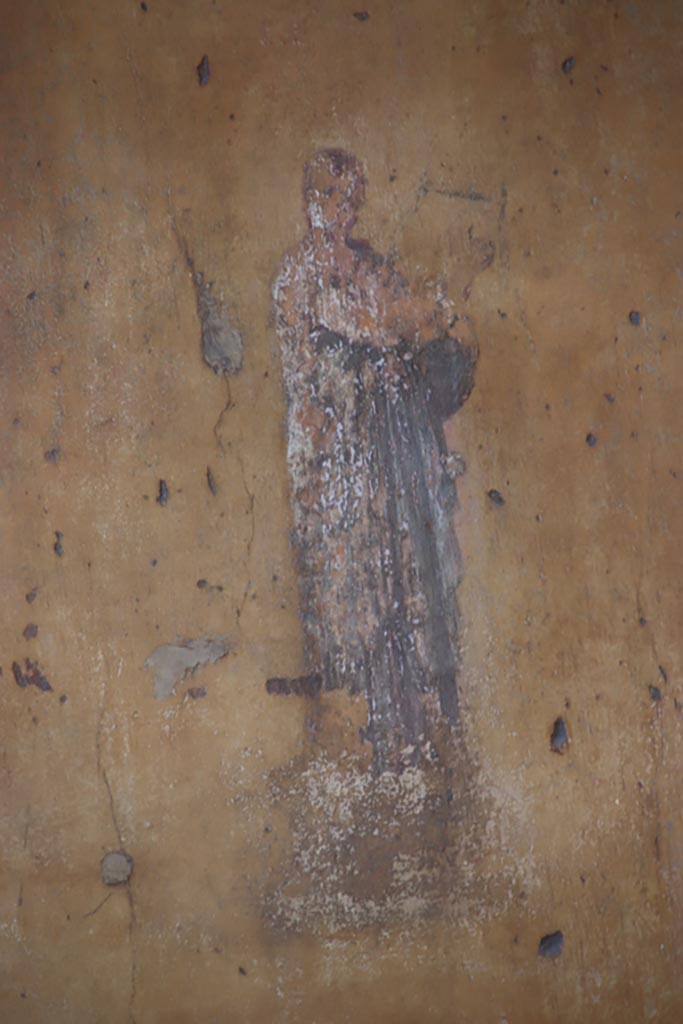 VII.1.47 Pompeii. October 2023.
Exedra 10, detail of Erato with lyre, from middle of side panel at east end of north wall.
Photo courtesy of Klaus Heese.