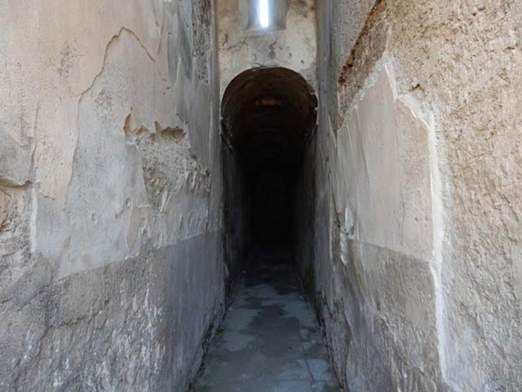 VII.1.48 Pompeii. May 2015. Looking east along corridor K.
This leads to apodyterium (changing room) 11 of the women’s baths.
Photo courtesy of Buzz Ferebee.