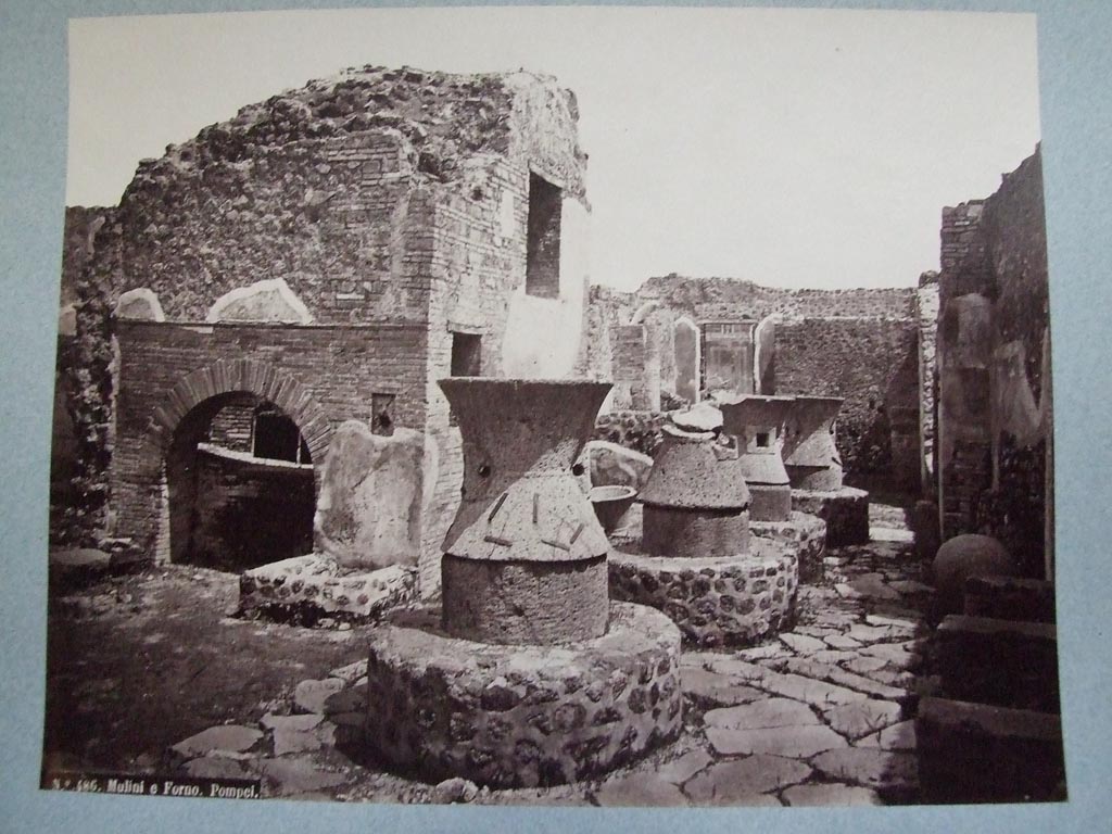 VII.2.22 Pompeii. Bakery of Popidius Priscus. Oven and mills. Old undated photograph.
Courtesy of Society of Antiquaries. Fox Collection.