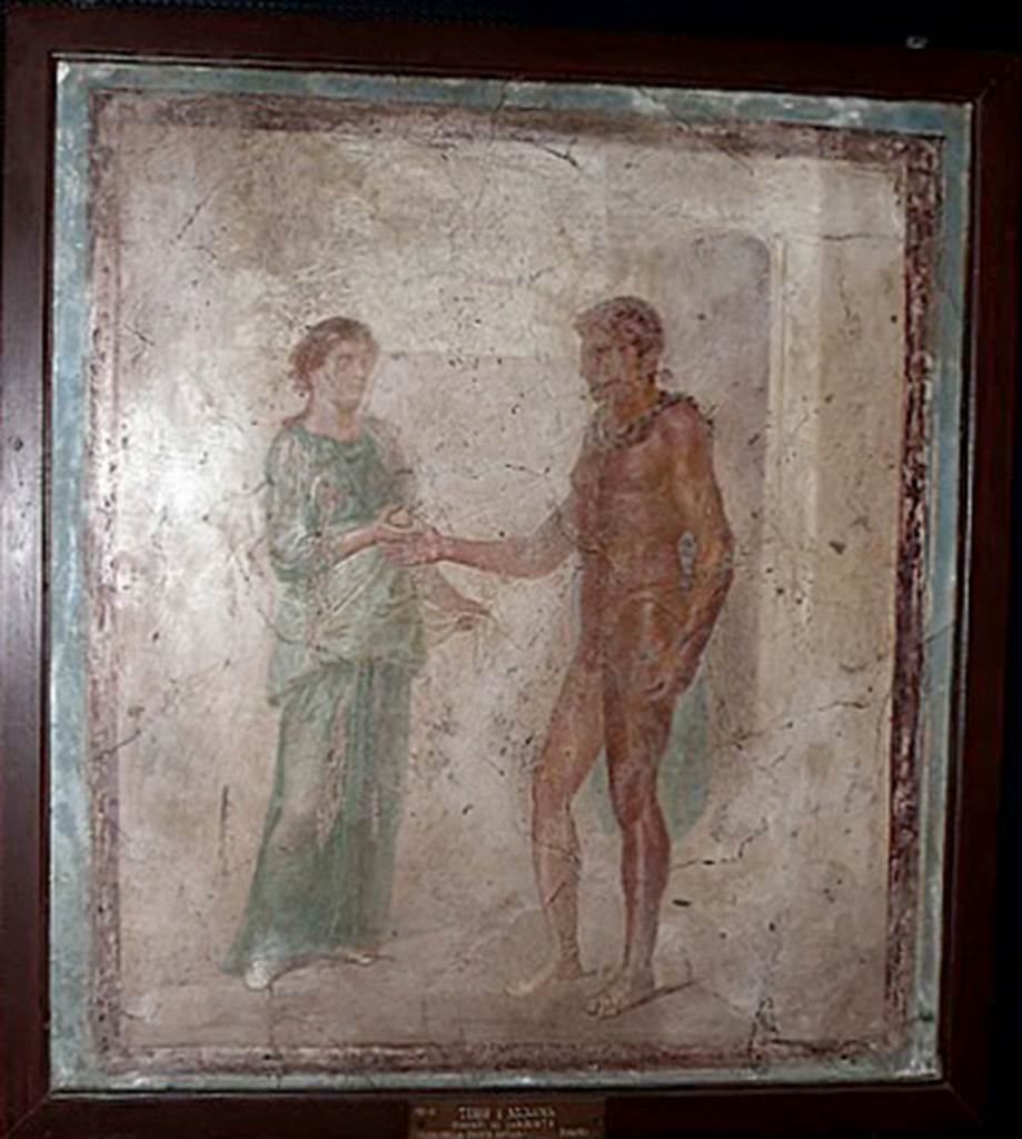 VII.4.48 Pompeii. Room 11, east wall of tablinum.
Painting of Ariadne giving Theseus the ball of string that will guide him out of the labyrinth.
Now in Naples Archaeological Museum. Inventory number 9048.
Helbig describes:
Theseus receiving the ball of yarn from and Ariadne: Theseus stands with blue chlamys, a sword (harpe) in the left hand, and stretches out the right to Ariadne, who hands him the ball of yarn.
She is standing in front of him in grey shoes and a green chiton cloak, holding a corner of her white cloak with her left hand.
Behind Theseus is the gate of the labyrinth.
See Helbig, W., 1868. Wandgemälde der vom Vesuv verschütteten Städte Campaniens. Leipzig: Breitkopf und Härtel, p. 253, 1211.