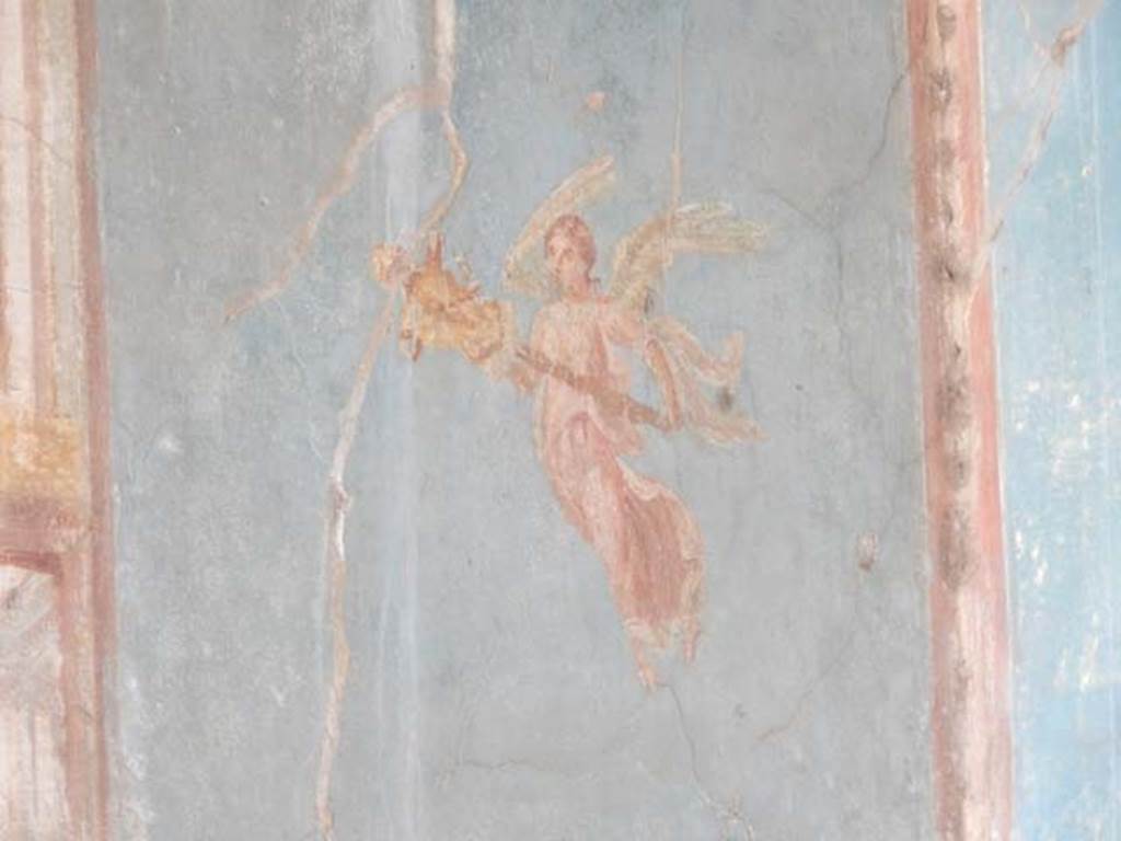 VII.4.48 Pompeii. May 2015. Room 11, detail from south end of east wall.
Photo courtesy of Buzz Ferebee.