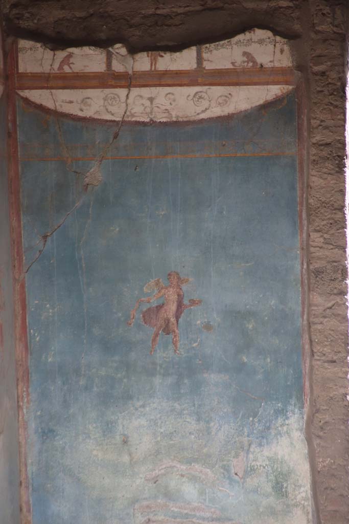 VII.4.48 Pompeii. October 2020. Room 11, detail from upper and middle of south wall in south-east corner of tablinum.
Photo courtesy of Klaus Heese.