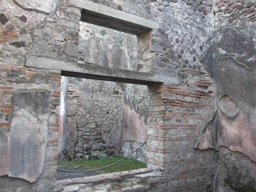 VII.4.48 Pompeii. December 2007. Room 12. South wall with window to peristyle garden room.