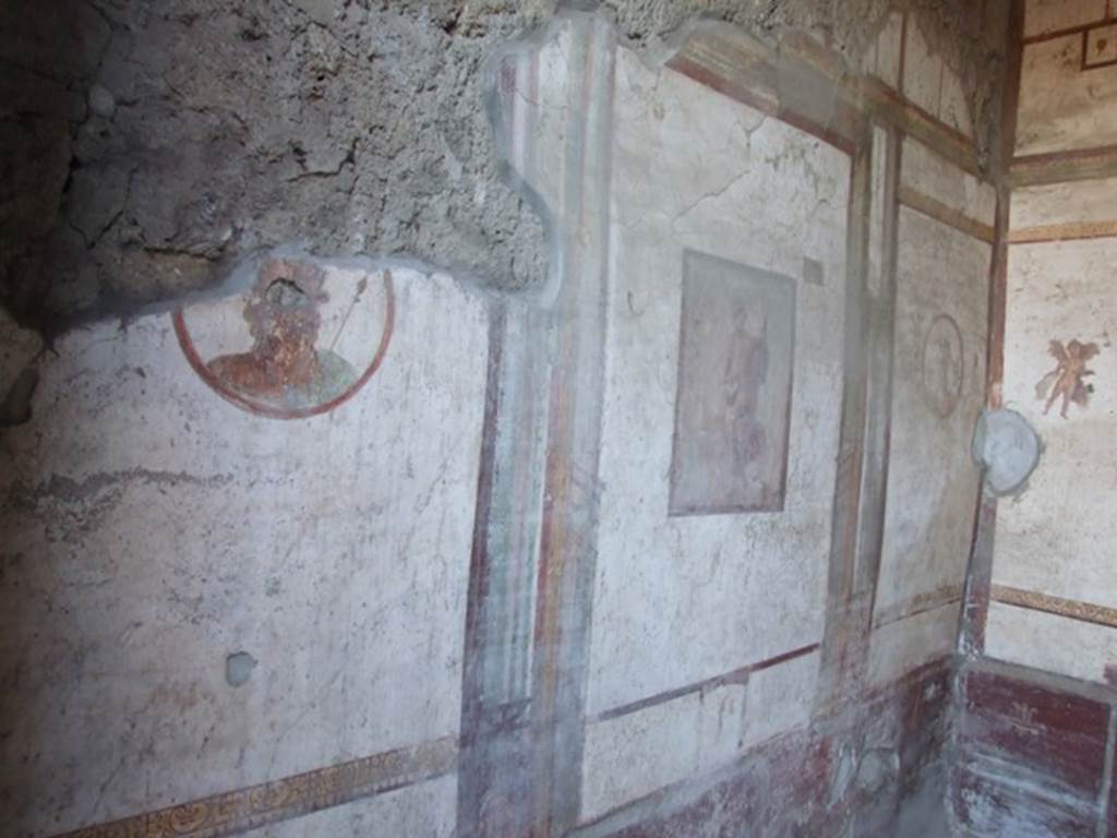 VII.4.48 Pompeii. December 2007. Room 14. Cubiculum. South wall.
Partially destroyed wall painting of Zeus, on left.