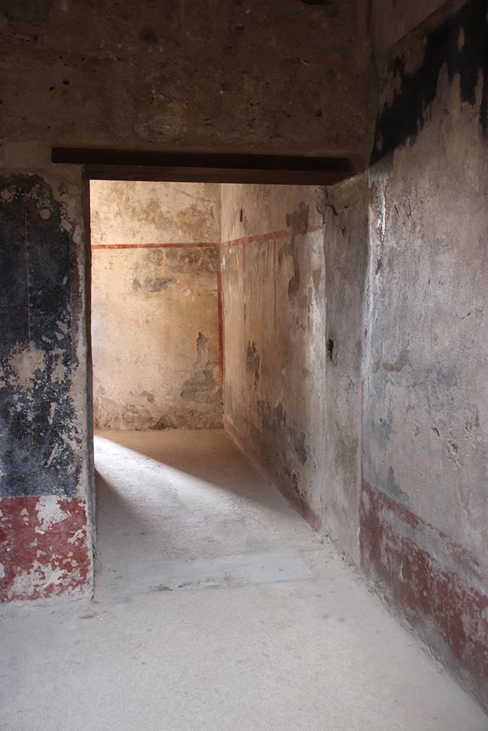 VII.5.8 Pompeii. October 2024.
Looking north towards doorway to corridor 45. Photo courtesy of Klaus Heese.