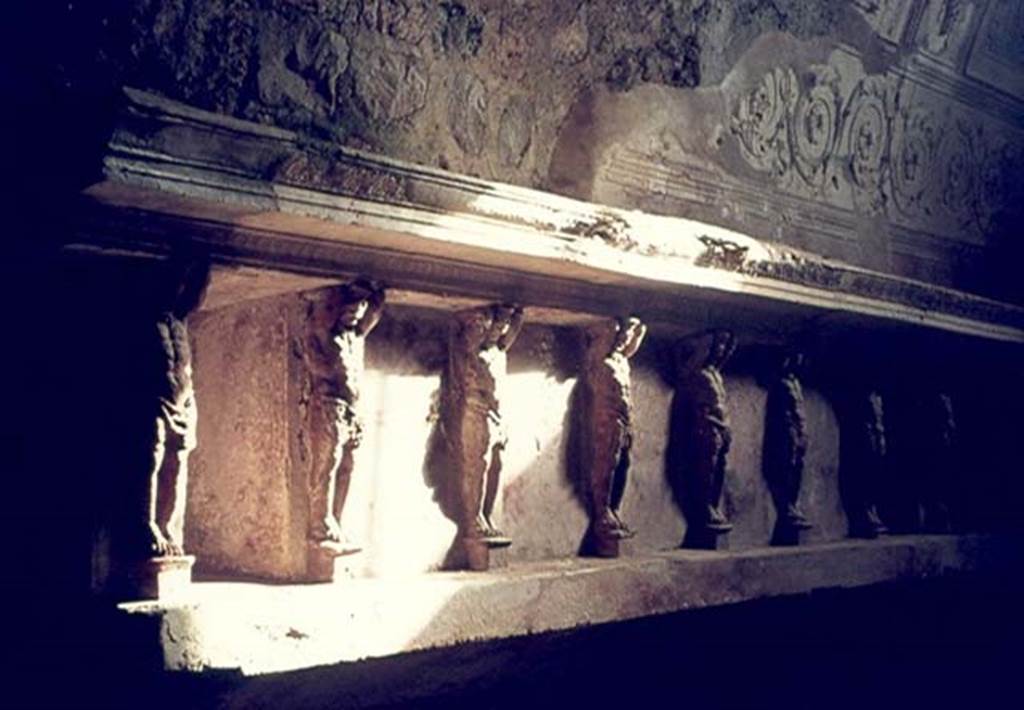VII.5.24 Pompeii. January 1977. Tepidarium, east wall with telamons. Photo courtesy of David Hingston.
