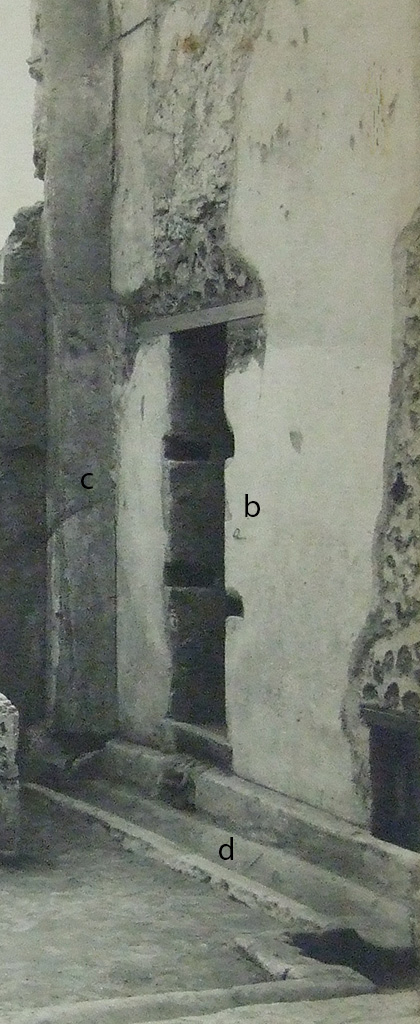 VII.6.3 Pompeii. Detail from Notizie degli Scavi, 1910, fig.2, p.443.
Doorway with lava threshold and two crossbars of wood (fig.2 b).
On the right is the window at soil-level.