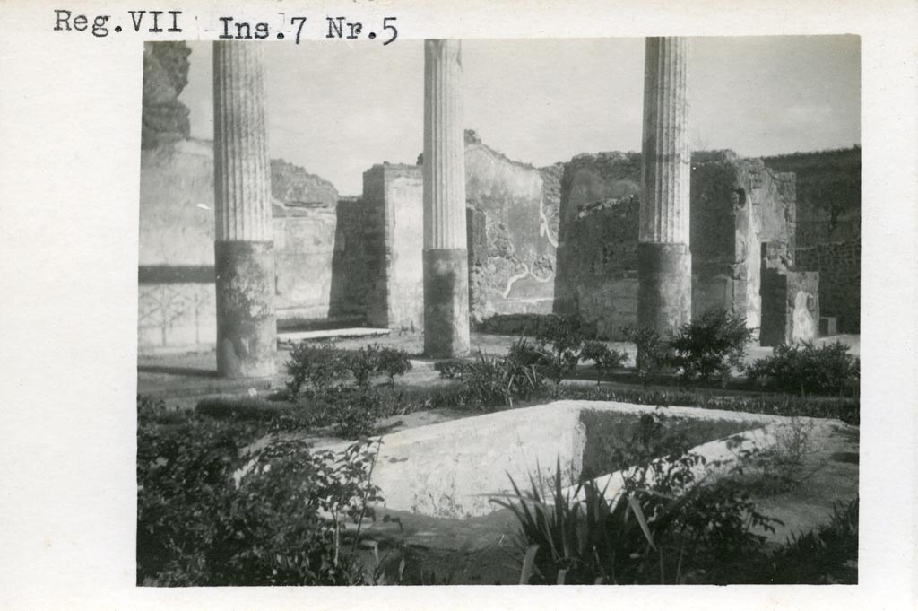 VII.7.5 Pompeii. Pre-1937-39. Looking south-east across pool in peristyle, with doorway to room (m) on left, and to atrium, on right.
Photo courtesy of American Academy in Rome, Photographic Archive. Warsher collection no. 442.