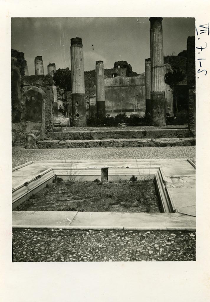 VII.7.5 Pompeii. Pre-1937-39. Looking north across impluvium in atrium (b), towards peristyle (l).
Photo courtesy of American Academy in Rome, Photographic Archive. Warsher collection no. 864.