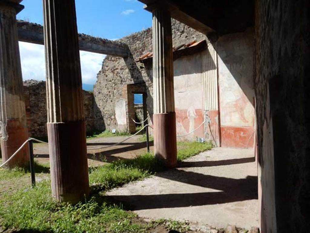 VII.7.10 Pompeii. May 2018. Looking south-west across peristyle, towards doorway to kitchen area. Photo courtesy of Buzz Ferebee.