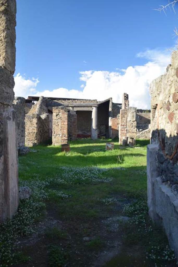 VII.7.10 Pompeii. November 2016. Looking north from entrance doorway.
Photo courtesy of Marie Schulze.
(translation - According to Pagano –
"From the vestibule, or protiro you pass into the atrium with its impluvium in the middle to collect the rainwater, and nearby to the same is the mouth of a small cistern. Four bedrooms, cubicoli, are arranged at the sides, with two alae; and from the one on the left you pass into a small room/cupboard, apotheca, which contained three wooden shelves, of which the outline remains. Between the second cubiculum and the ala on the right, there is a rectangular block of Vesuvian stone, where traces of iron oxide can be seen. This was the place where the money chest of the owner was kept, which was also closed to the wall by an iron plate, which still exists for the most part.
Facing the entrance doorway was the reception room, tablino, and to the right of it, in that room preceded by two steps of white marble, was the painting of the wolf that feeds the twins.
To the left of the same tablinum is a narrow corridor, fauces, which leads into the interior of the house intended for women. In the centre was a garden of flowers, and the prospect of a wall of a grandiose painting of animals, that is a snake wrapped around a tree trunk, an elephant, a bull, a mule, a goat, a lion, a fox, a bear. To the left was seen a garden with fountain flanked by Cariatids, with a large peacock, and topped by statue of a Silenus lying on his wineskin.
From the door on the left you enter the dining room, followed by the kitchen, equipped with a toilet (now restored with modern wood). (Note this would have been c,1881).
On the right side of the same garden was a recess without a door, where the site of the wooden stairs, which led up to the upper floor would have been.
Finally, at the rear was the rear door or exit door, protruding into a vicolo/alley.")
See Pagano, N. (1881). Guida di Pompei, ed.9. (p.13-15).