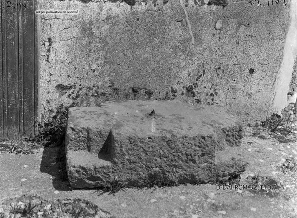 VII.7.10/13 Pompeii. 1932. Base of money-chest found on east side of atrium.
According to Pernice -
Found in the atrium on the right wall in front of the Ala. Base of a money chest made of lava.
In the middle is a lead-cast iron spike. The corners are notched for right-angled feet.
See Pernice, E., 1932. Hellenistische Tische, Zisternenmündungen, Beckenuntersätze, Altäre u. Truhen. Berlin, p. 72, Taf. 43.2.
DAIR 32.1107. Photo © Deutsches Archäologisches Institut, Abteilung Rom, Arkiv.
Thanks to Espen B. Andersson for assisting us in our interest in money-chests.