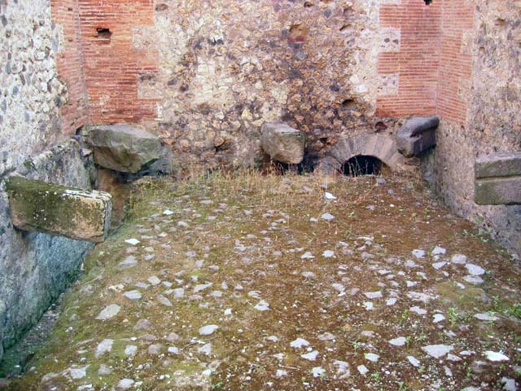 VII.7.28 Pompeii. July 2008. Looking west across latrine. Photo courtesy of Barry Hobson.
The latrine had not yet been completed by the time of the 79AD eruption.
The walls were lacking plaster. The water supply pipes were not connected to the city water supply.
The drainage pipes were not connected to the city sewerage.