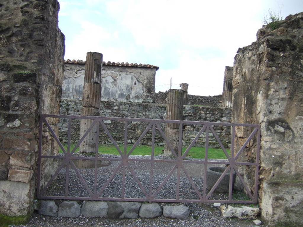 VII.7.32 Pompeii. December 2006. East side of Temple of Apollo adjacent to Forum