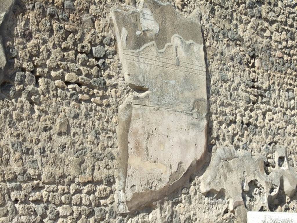 VII.7.32 Pompeii. March 2009. East wall at side of entrance. Remains of plaster.