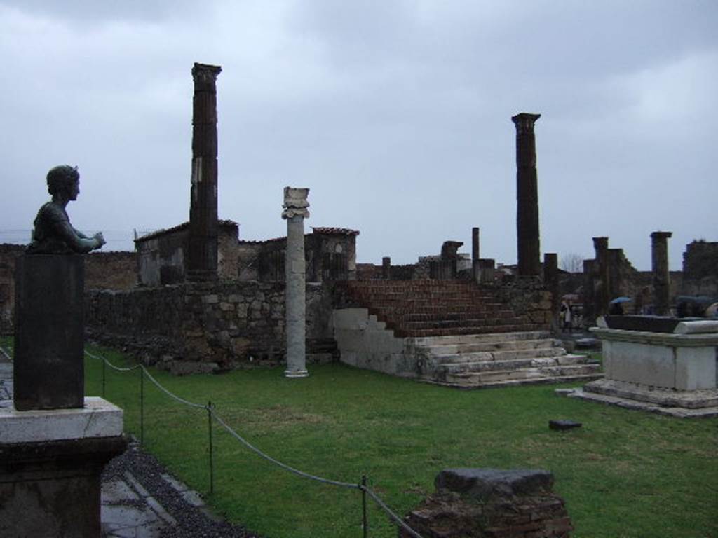 VII.7.32 Pompeii. December 2005. Looking north east towards Altar, Podium and Cella. The statue of Artemis is in front of the third column on the west side.