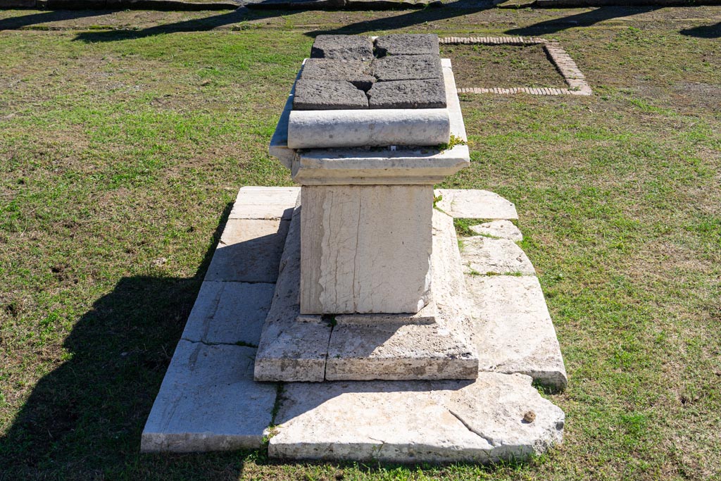 VII.7.32 Pompeii. October 2023. Detail of top of altar, photo taken from podium. Photo courtesy of Johannes Eber.