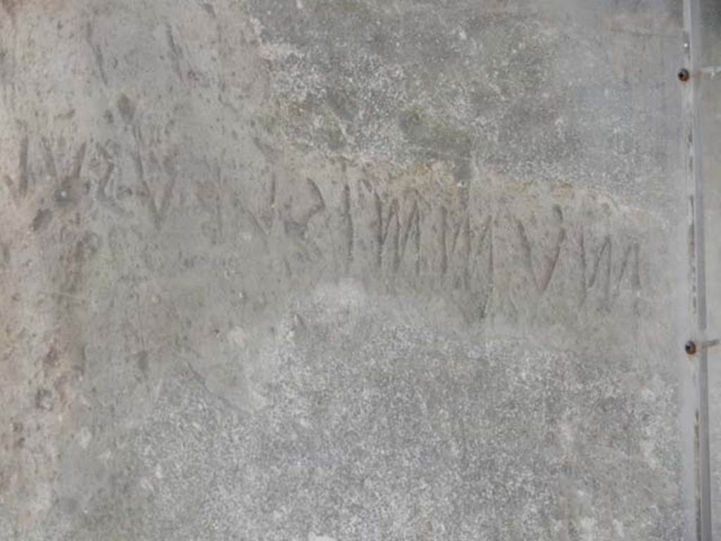 VII.7.32 Pompeii. May 2018. Inscription in south-west corner of Temple. Photo courtesy of Buzz Ferebee.