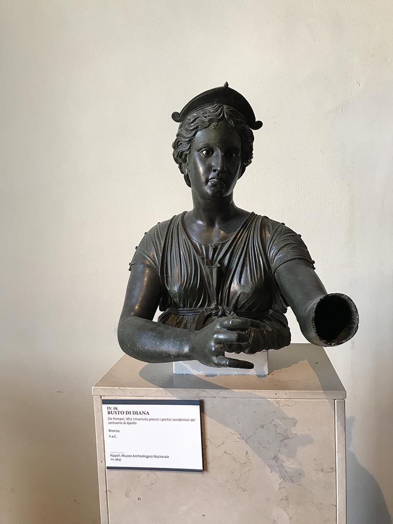 VII.7.32 Pompeii. April 2019.
Bronze bust of Diana/Artemis, found 1817 towards the west portico of the sanctuary of Apollo.
Now in Naples Archaeological Museum. Inventory number 4895. Photo courtesy of Rick Bauer.