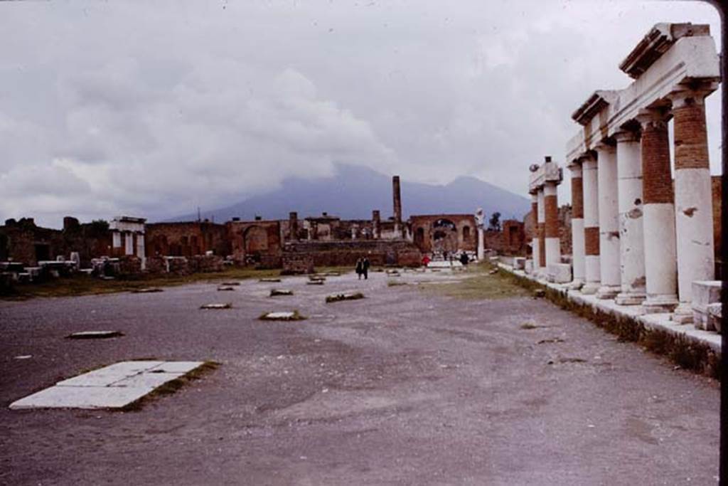 VII.8 Pompeii Forum, 1964. Looking north along east side. Photo by Stanley A. Jashemski.
Source: The Wilhelmina and Stanley A. Jashemski archive in the University of Maryland Library, Special Collections (See collection page) and made available under the Creative Commons Attribution-Non Commercial License v.4. See Licence and use details. J64f0984